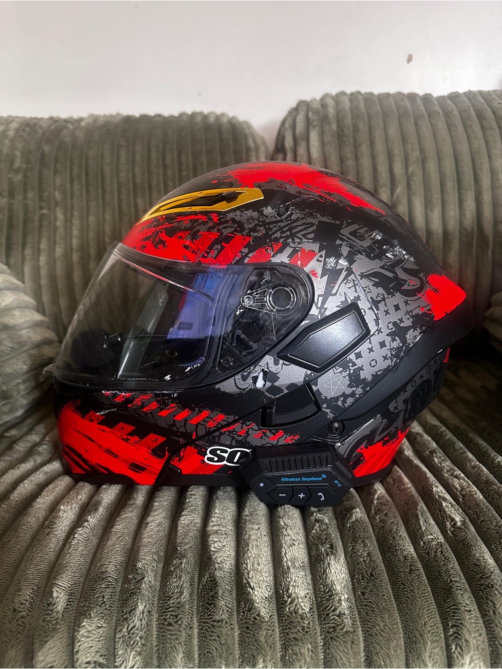 Motorcycle Helmet with Red and Black Graphic Design